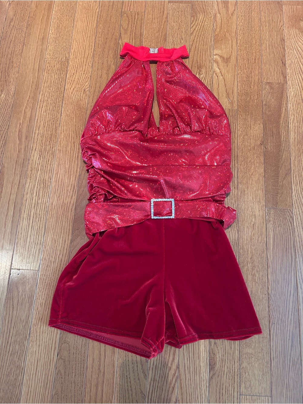 Young Woman’s Sparkling Red Halter Romper with Rhinestone Buckle